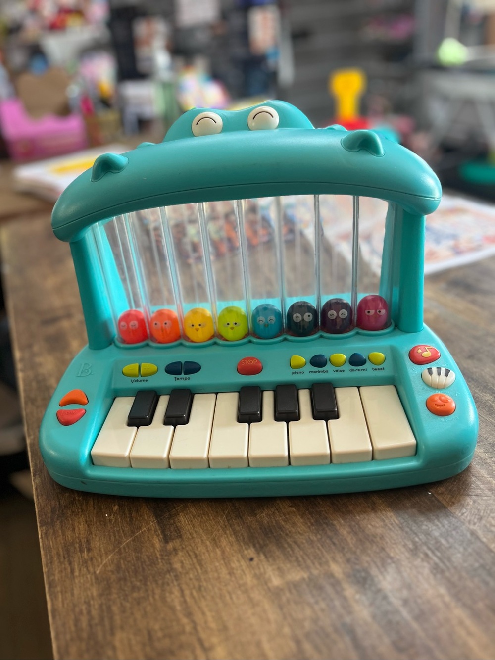 B. Toys Hippo Pop Musical Toy Keyboard Play Piano Songs Sounds Lights Instrument